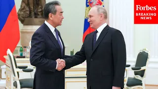 China Fortifies Partnership With Russia, As Top Diplomat Meets With Putin