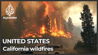 California battles wildfire as blazing heat hits western US