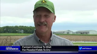 Farmers Continue To Wait For Flooded Fields To Dry