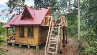 Build a wooden house (cabin) with 2 doors and a balcony on high for sightseeing and drinking tea