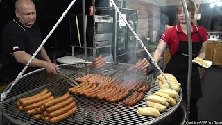 Grill of Sausages, Ribs and Steaks from Poland. Street Food from Italy