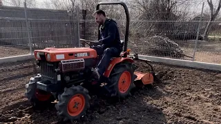 preparing the soil with my kubota b7000 tractor and the original tiller, for planting potatoes