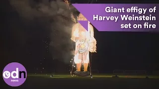 Giant effigy of Harvey Weinstein set on fire in England