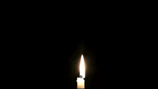 Flame Being Carried By Smoke Of Candle And Lights It Again