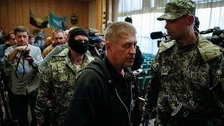 Russia offers to help free OSCE observers held by separatists in Ukraine