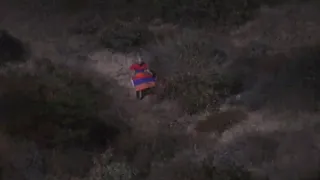 Armenian protestor at the Hollywood sign - HAXTELU ENQ