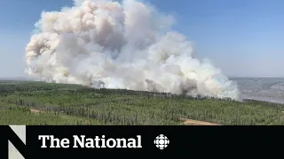 Alberta wildfires force thousands from their homes