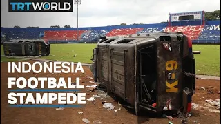 At least 125 dead in stampede at football stadium in Indonesia