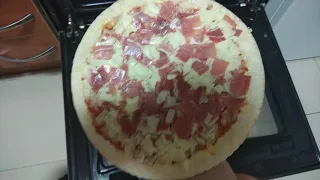 Cómo cocinar una pizza precocinada parte 1