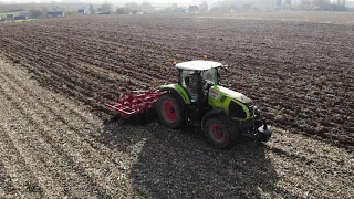 Claas axion 800 met steeno 6 meter cultivator