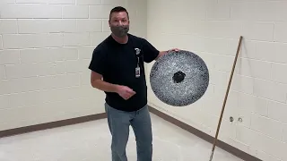 A demonstration of chemically stripping wax off of a (vct) tile floor