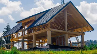 Building The Roof Of The Log Post And Beam House