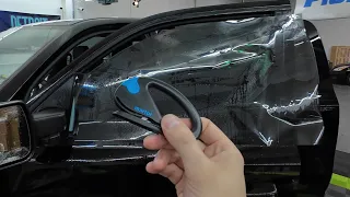 Cut window tint safely without cutting the car