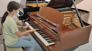 Nina tries J. Becker Piano (built 1880)