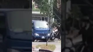 Cyclist Punches Driver!