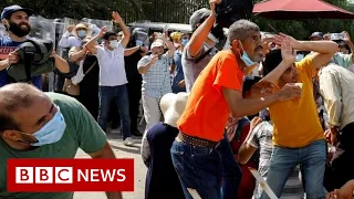 Tunisia's PM sacked after violent Covid protests - BBC News