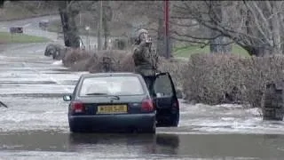 High winds and heavy rain lash UK