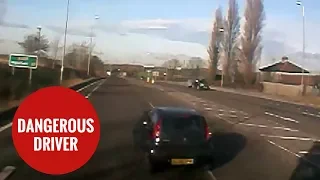 Dramatic dash cam captures car cutting up lorry with inches to spare