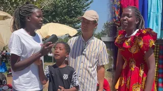 My husband and son visited rural Ugandan market for the first time