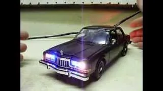 Custom 1:24 scale 1986 Dodge Diplomat undercover diecast with working lights