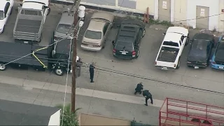 Suspect in LA police pursuit runs, hides under car