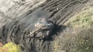 A Russian T-80BV tank is struck by a Ukrainian FGM-148 Javelin anti-tank missile in the East