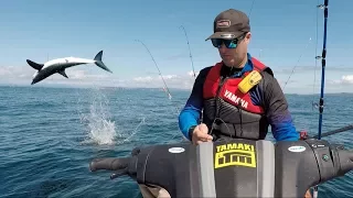 Shark jumps at Jetski Fisherman!
