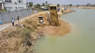 Expand Additional​ Road on Canal Escape from the factory fence by Operator Bulldozer and Dump Truck