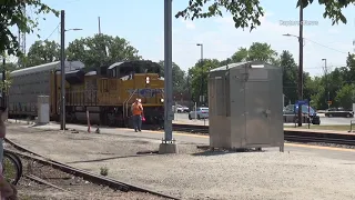 Freight Train Passing Fatal Crash Scene at "Walking Pace" at Morton Grove Metra Train Station