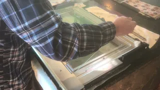 Cleaning between the glass on a Jenn-Air range door