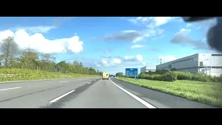 Driving in Germany from Niederkassel to Bonn in North Rhine-Westphalia on a clear Spring day