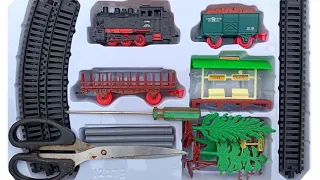 Assembling trains and unboxing ancient steam train toys, freight trains