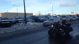 St. Paul police motorcade with Santa heading to Children's Hospital to bring gifts to kids Wednesday