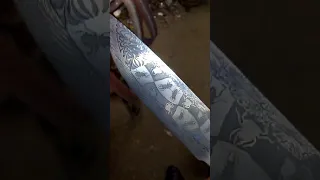 Mosaic damascus blade