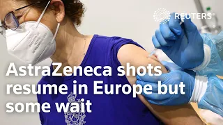 AstraZeneca shots resume in Europe but some wait