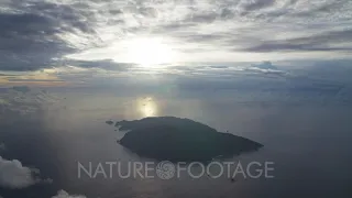 Very high aerial, gradually approaching Cocos Island