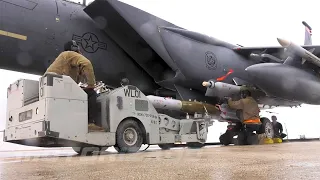 Air Force Weapons Loaders Arm B-1B Lancer Bomber and F-15E Strike Eagle Fighter Aircraft