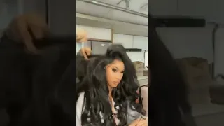 Cardi B "Wearing 5 wigs at once"