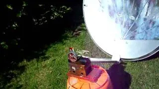 Parabolic dish powering a small steam engine