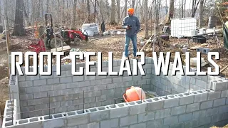 Building the root cellar walls with concrete block // E135