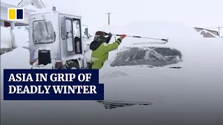 Deadly winter weather across Asia brings record snowfalls, low temperatures and icy winds