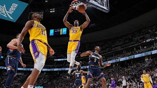 DWIGHT HOWARD MAKING A CASE TO BE THE LAKERS STARTING CENTER I 13 PTS 6-8 FG 3 OFF.REBS VS NUGGETS