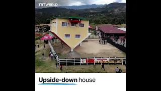 Upside-down house in Colombia leaves visitors puzzled