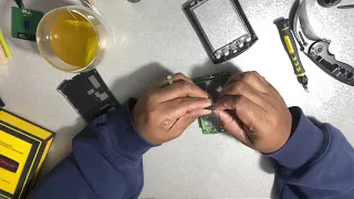 Opening up a Palm m505. What’s inside?