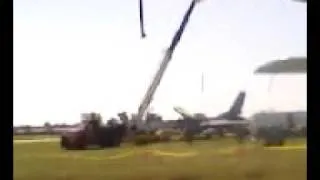 F-16 Crash at AirVenture 2011 being lifted on to a truck