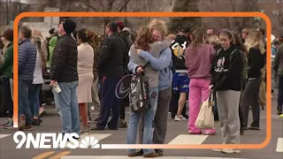 Parents reunite with students after school shooting in Denver