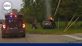 Woman trapped in burning car