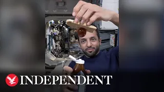 Astronaut shows how honey reacts in zero gravity in video of him making snack in space