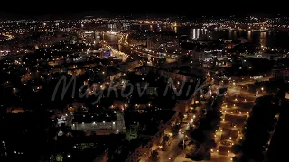 D-Log. Astrakhan, Russia. View of the city of Astrakhan at night. The embankment of the Volga backwa