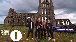 "I thought this was a secret!"  Greg James talks to Coldplay at Whitby Abbey